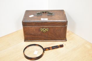 A Georgian mahogany tea caddy, with rounded corners, and measuring 14cm x 23cm x 13cm overall,