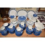 An extensive selection of mid century Johnson Bros table ware, having blue floral pattern to white