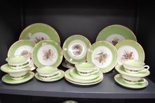 A quantity of mid-20th Century Czechoslovakian Epiag tea ware, on green ground and decorated with