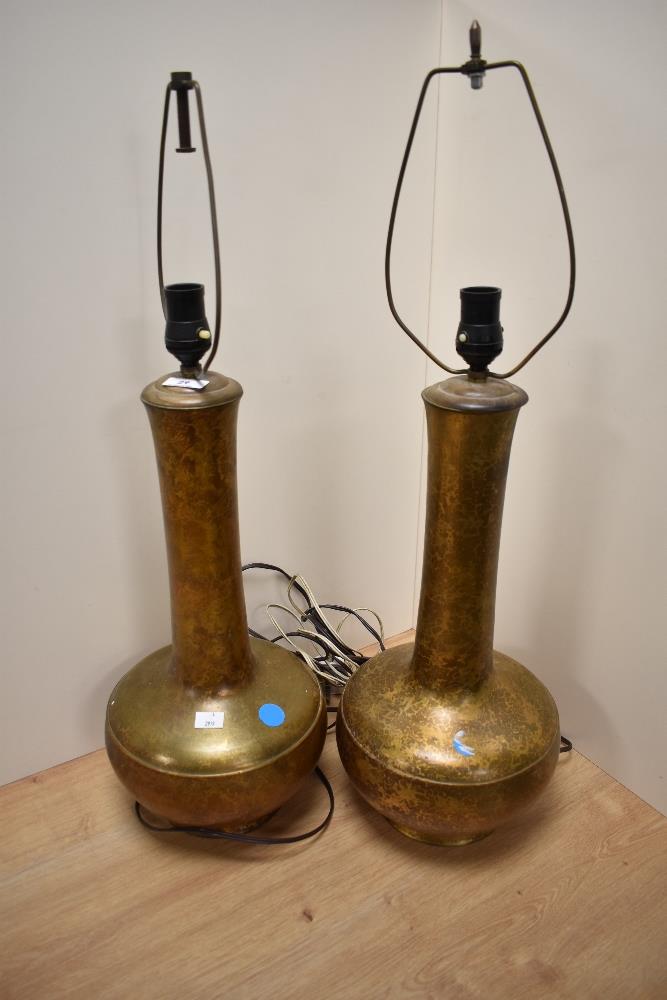 A pair of attractive 20th Century bottle shaped lamp bases, lustre coloured and with patinated