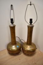 A pair of attractive 20th Century bottle shaped lamp bases, lustre coloured and with patinated