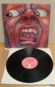 A VG+/VG+ copy of ' in the court ' ... By King Crimson on an early Island label press