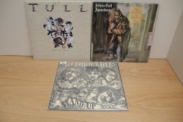 A lot of 4 albums by Jethro Tull albums - including pop up sleeve as in photos