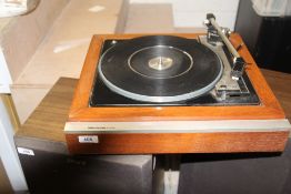 A Wharfedale Linton turntable with dust cover