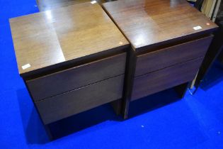 A pair of vintage teak bedside drawers , labelled Meredew