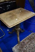 A 19th Century bleached mahogany occasionallt table having rectangular top, tulip column and