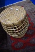 A vintage wicker barrel shape stool or plant stand, height approx 46cm