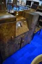 An early to mid 20th Century mahogany and walnut bureau in the Art Deco style, with enclosed