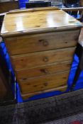 A modern pine chest of four drawers, approx. H87 W58 D46cm