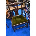 A Georgian oak carver chair having green dralon upholstered seat, width approx. 68cm