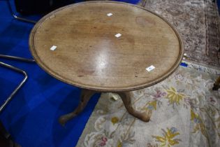 A 19th Century pedestal occasional top having circular top, turned column and triple splay legs,