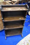 An early to mid 20th Century dark oak bookshelf of small proportions , approx dimensions W53 D20