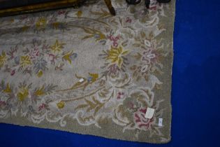 A traditional floral rug, approx 180 x 88cm