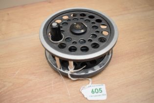 A 4,25 inch J W Young fifteen hundred series 1540 fly reel