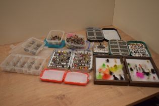 A Large collection of salmon and trout flies mostly in pocket boxes