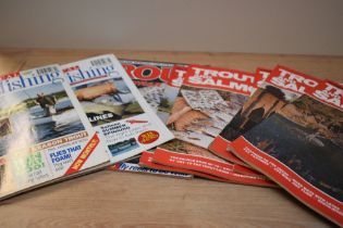 A large collection of Trout and Salmon magazines dating back to the 1970s and some fly tying