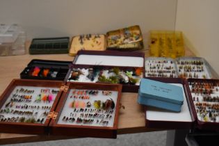 A selection of salmon and trout flies in several boxes