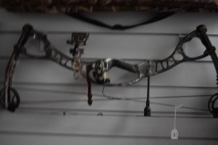 A HOYT CRX 32 40-80LBS Compound Bow recently serviced with spare string Apache drop down sight,