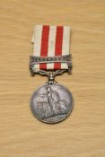 A Queen Victoria Indian Mutiny Medal with Lucknow Clasp and ribbon to CORPl.ROBt.ARMSTRONG.3rd.Bn.
