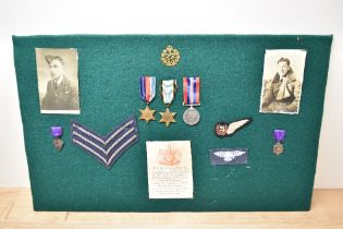 A WWII Medal Group on display board to Sergeant William Stanley Edwards RAF Bomber Command, 1939-