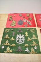 Four boards of Cap Badges and Helmet Plates, seen Dumbartonshire Rifle Volunteers, Royal Frontiers
