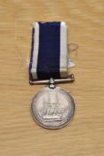 A Queen Victoria Royal Naval Long Service and Good Conduct Medal, narrow suspender, impressed naming
