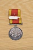 A Queen Victoria China War Medal 1900 with ribbon to J.A.JONES.STO.IC.HMS.ALACRITY, campaign Boxer