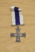A Military Cross with ribbon, unnamed as issued