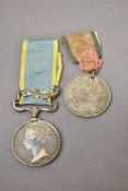 A Queen Victoria Crimea Medal with one clasp, Sebastopol to J.Moore 13th Regt, along with The
