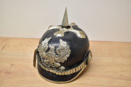 A German leather Pickelhaube Helmet with leather chin strap, numbered 56 and making town of