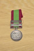 A Queen Victoria Afghanistan Medal with two clasps, Kabul and Kandahar with ribbon to 1053 PTE.J.