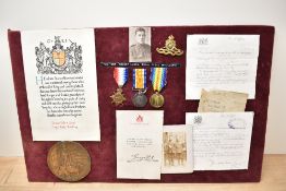 A WWI 1914-15 Trio, 1914-15 Star, War and Victory Medals to 726GNR.R.Lloyd.R.F.A along with Memorial