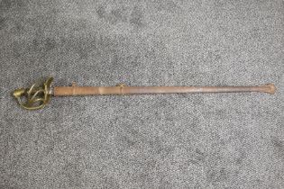 A French Heavy Cuirassier Troopers Sword c1810, four bar brass hilt, double fullered blade, metal