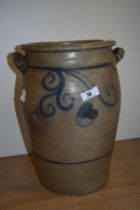 A Victorian stoneware slop pail, decorated with a blue stylised design, with two carrying handles,