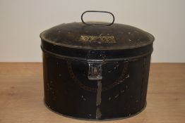 A 19th Century enamelled black hat tin, measuring 28cm tall