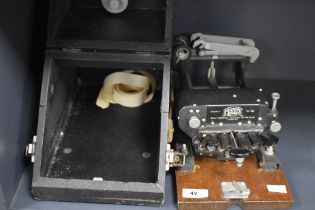 An early 20th Century Matrix Model G braille typewriter with case