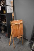 Two adjustable artist's easels