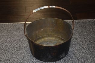 A Victorian brass jam pan.
