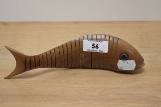 A 20th Century Australian articulated wooden Jarrah fish, by George Chirnside, measuring 20cm long