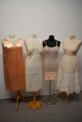 A selection of vintage lingerie, to include CC41 utility labelled knitted slip, 1930s peach slip and