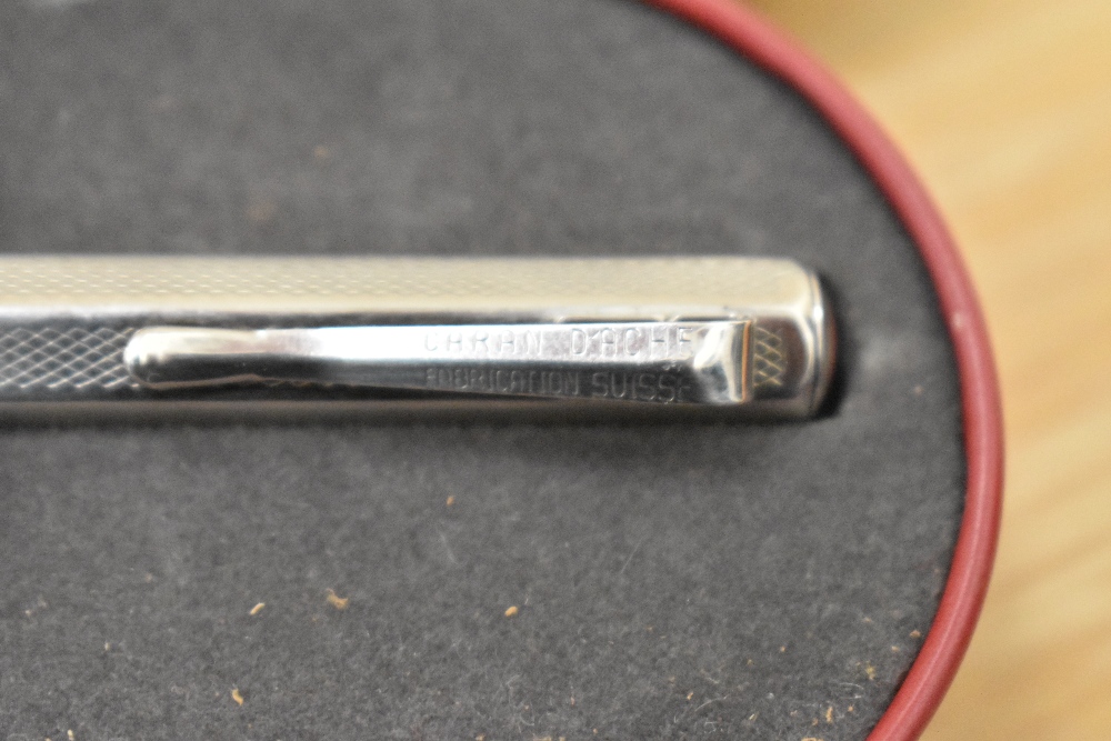 A Boxed Caran d'Ache Ecridor Retro rollerball pen, palladium coated with diamond design Ref 0838. - Image 3 of 4