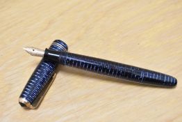 A Parker Vacumatic Junior fountain pen in blue with two narrow bands to the cap and Parker USA nib