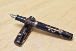 A Waterman Junior lever fill fountain pen in bronze marble with single narrow band to the cap having