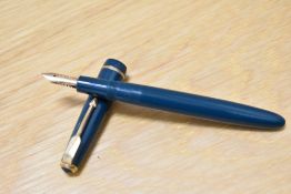 A Parker Duofold Junior aerometric fill fountain pen in green with narrow decorative band to the cap