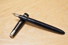 A Parker Slimfold aero fill fountain pen in black with a narrow decorative band to the cap having