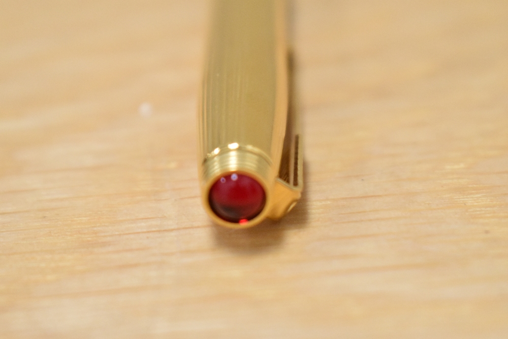 A Parker 75 converter fill fountain pen in burgundy laque with gold cap which has ruby coloured - Image 3 of 3
