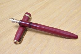 A Parker Duofold Maxima Aerometric fill fountain pen in red with decorative band to the cap having