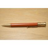 A Parker Duofold propelling pencil in red