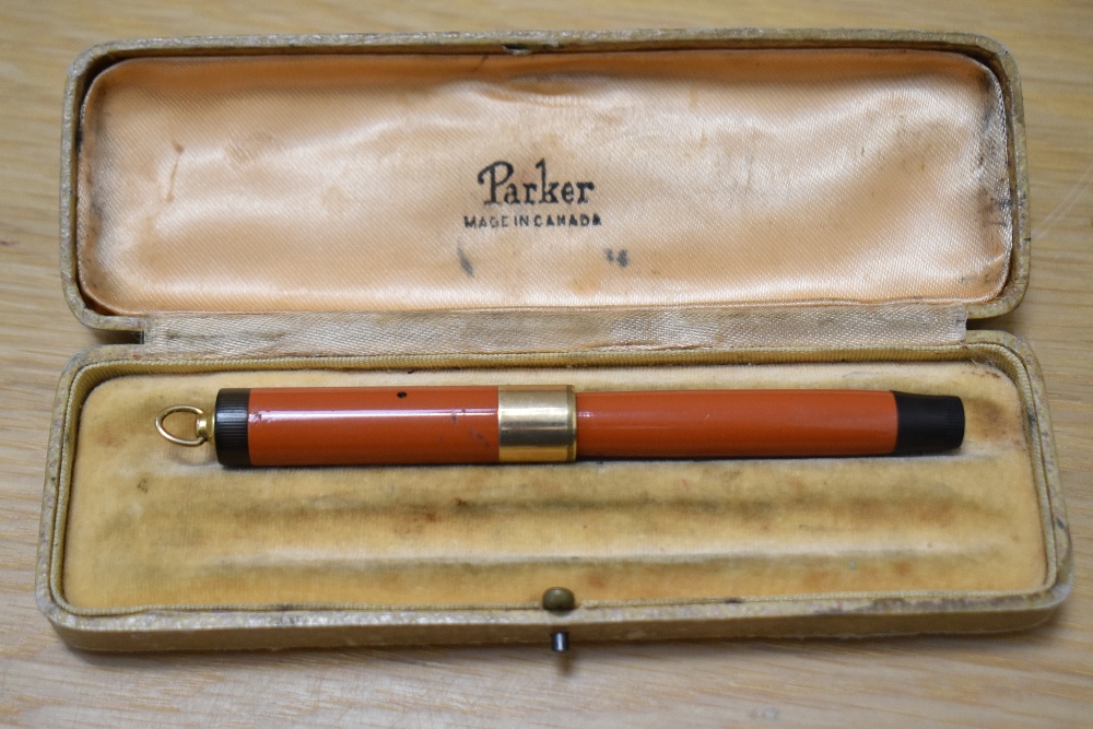 A Parker Lady Duofold Lucky Curve button fill fountain pen in red with broad band to a ring cap - Image 4 of 4