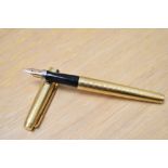 A Parker 75 converter fill fountain pen in Tiffany Grid 14K gold fill having a Parker 14k USA nib